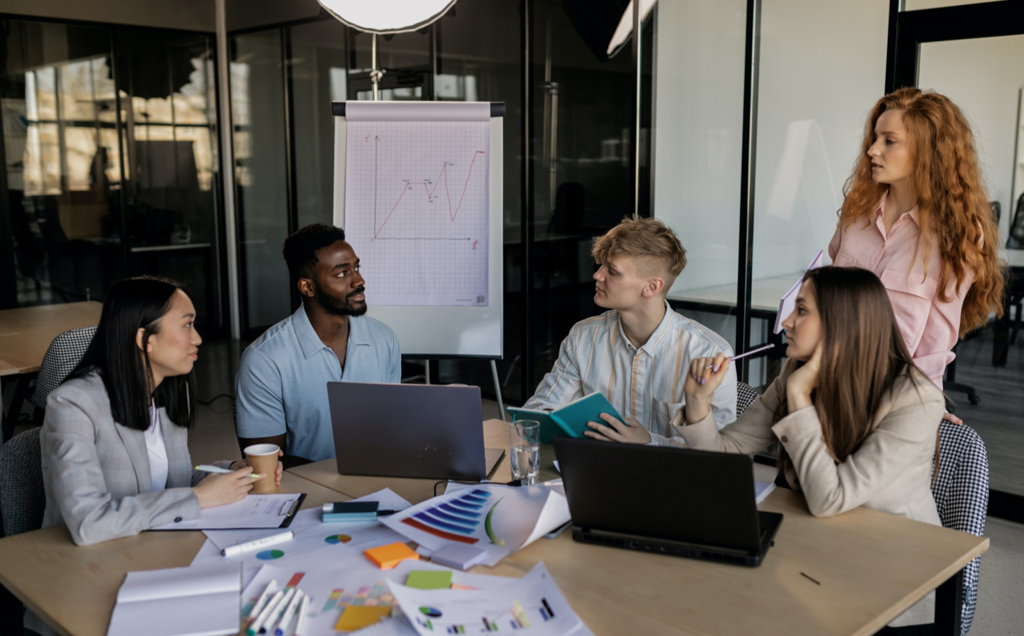 Team members in a relaxed working conversation