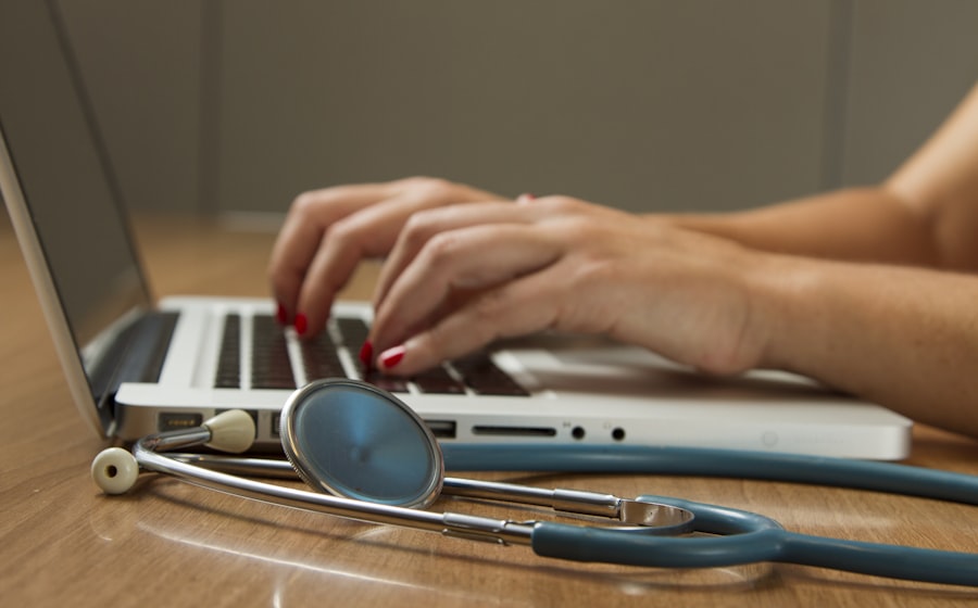 Medical staff member managing appointments at a clinic front desk