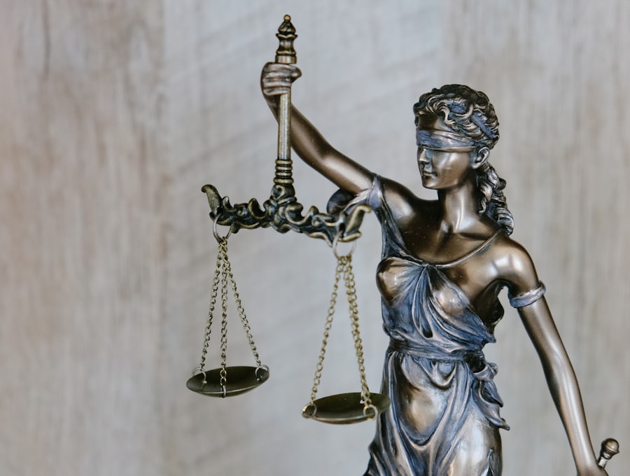 Law books and a gavel on a desk in a legal office